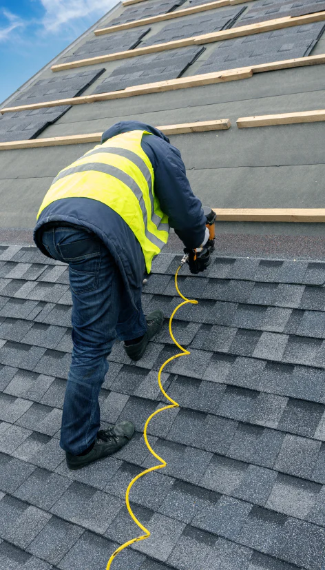 a roofing contractor installing roofincag shingles during roofing installation service aberdeen wa